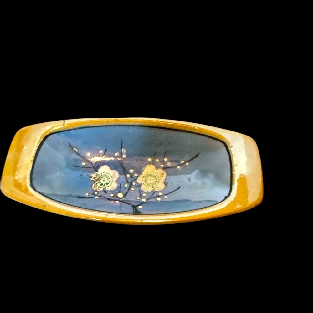 Lusterware Dish with Cherry Blossoms on Blue and Peach background. (F)